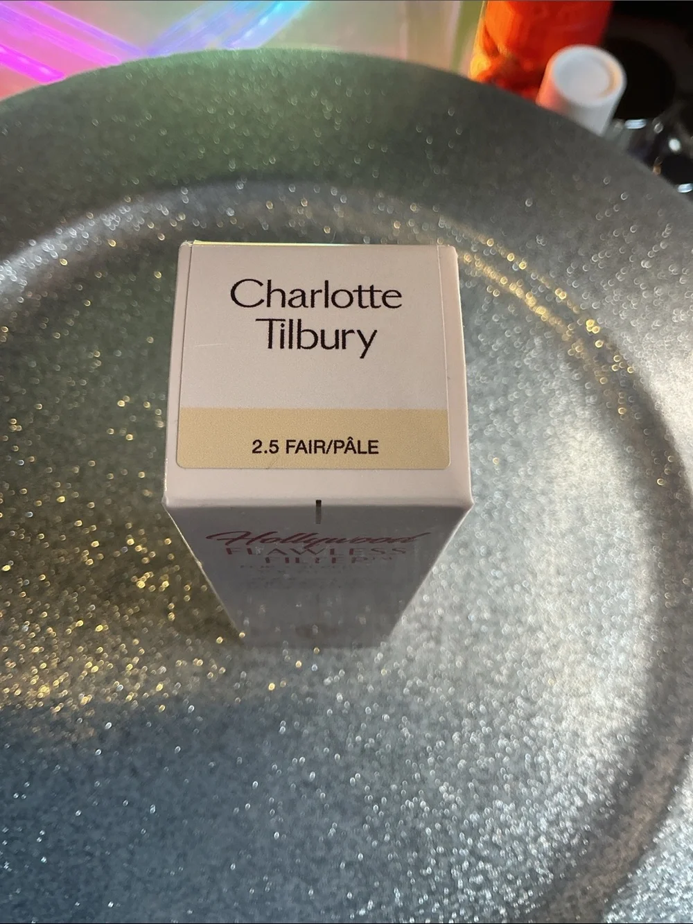 Product Box on Glitter Surface